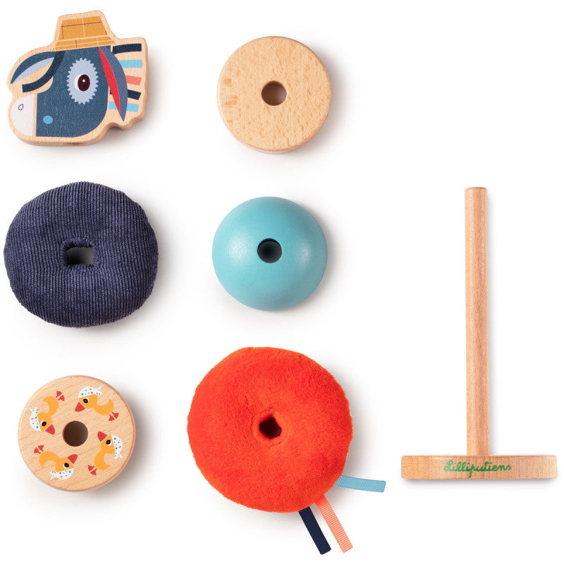 "Lilliputiens stapeltoren met vrolijke kleuren en gerecycled materiaal"