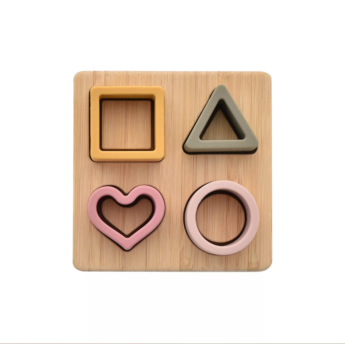 "Hart puzzel van BAMBINO BY JULIANA® met bamboe-effect hout en kleurrijke siliconen puzzelstukjes."